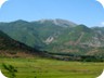 Arithit, or Maja e Bardhë. It is considered to be white mainly in contrast to the red rocks of the nearby Micekut Mountains.