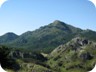 The ascent follows the ridge facing the viewer. The tricky part is the bushwhack from the Fushe to the grassy ridge