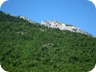 One of the more exposed pieces of trail, near Qafe Priske. The trail leads over the top of the rocks.