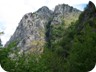 Approaching the summit cliffs. The terrain is getting exposed and steep