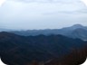 Hiking Mali i Hutit. In the distance Veles Mountain