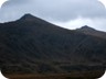 A close up from the same spot. The knob peaking from between the two pyramids on the ridge is very close to the actual summit.