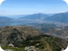 View from the summit to the east, with (from left to right) Pashtrik, Koritnik, and Gjalica Mountains.Trails to their summits are described elsewhere on this site. The proportions are deceiving. It is 2000 altitude meter between Kukes town at the foot of Gjalica and its summit.