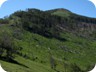 The ridge to the summit of Kalimash. The trail is mostly easy, using the grassy slopes. Short stretches are rocky and overgrown.