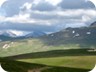 Mali i Kallabakut. The lonely military base is separated from the mountain by a deep valley; in the distance the Sharr Mountain Range in Kosovo.