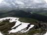 View towards the Sharr Mountains, from Kallabaku. Kallabaku sits on the border between Albania and Kosovo, and the border between the two runs along the nearby ridgeline, just above the snow. The distant peaks form the border between Kosovo and Macedonia