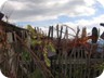 At the gate. The secondary summit seems to be privately owned, and it is best to enter the gate to reach it. (We reached the summit from the other end, but had to cross some fences, which was not easy)