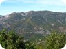 The area of Bicelle and Branesh, seen from the Labinot road. Elbasan is to the left. The road leads through the quarry on the left, and goes along close to the ridgeline to the right.