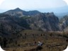 View back to the trailhead (with our car) and the wild rocks of Guri Gjon