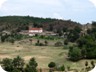 Approaching Malaj village with its church