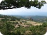 View back to Malaj with its characteristic rock in the middle of the village