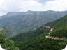 The easy way up the plateau. The road can be seen as it cuts diagonally up below the cliffs of Shentejt Mountain.