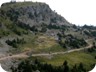 Two IFA trucks with their timber loads inching into the valley. They still have to descend for more than 1000 Meter before reaching the valley floor.