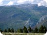 This image of the trail was taken from a trip to Allamani Mountain. It shows Mali i Dejes (a worthwhile hiking destination, see separate webpage). Below it the feature known as Gryka e Varroshit, near Qafa e Murres. The road with some switchbacks passes nearby.