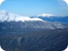 Smolikas, in Greece. The white pyramid on the left is part of Nemercke mountain, but not its summit.