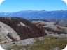 Views opening up, towards the border to Macedonia. From left to right: Gjallica (near Kukes), Korabi (the complex massif), Velivar (the pyramid in the center of the image), and Kërcin (the sharp pyramid somewhat to the right). We posted trails to all of these. The two minor bumps on the right are in Macedonia.