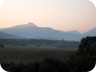 Driving from Gramsh towards Grabove. Mali i Komjanit, though lower than the surrounding mountains, catches the attention.