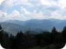 The hike up Mali i Komjanit gives glimpses to mountains that tend to hide from view. Here, Valamares in the distance.