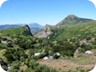 The Split RocK and Mali i Komjanit in daylight, as seen from Grabove Siperme. The two sides of the Split Rock seem to have different names: Sh. Kopçit (on the left) and Sh. Nhaut (on the right).