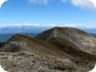 View towards what we take to be the main summit. It is said to be 1806 meter, though our GPS had a low day and recorded 1803 meter only - 19 meter higher than the designated summit with the tripod which - on our GPS - topped out at 1784 meter.