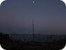 View towards Mali i Zebes, at dusk. The Autobahn runs in the valley between Munella and Zebes