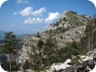 View back to Guri i Nuses. The drop just below the summit is hidden from view