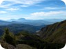 Driving to the trailhead of Ostrovice, from Elbasan. View to Tomorri. Elbasan can be seen  in the Shkumbin valley