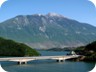 Gjallica Mountain, with the bridge across Fierza Lake that connects Has district with Kukes