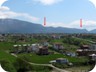 A view of the ridge formed by Priske Mountain, near Tirana. The hike up Priske summit is described elsewhere. This hike starts in the village of Përcëllësh, ascends the ridge at the left arrow and follows the ridge to the right arrow. From there it descends a little and returns along the side of the mountain to the trailhead.