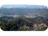 view from the castle across a wild landscape of erosion