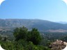 The mountain, on the top of which sits Pilur, seen from Himarë. The road to Pilur, near the mountain ridge, can be seen.