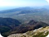 Mali i Rencit (left, near the searshore) and Mali i Jushit (more rounded) lying side-by-side. The old road from Tirana to Shkodra used to run between the two ridges. In the distance, Rumija Mountain in Montenegro. Picture taken from Veles Mountain near Lezha.