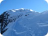 We generally followed the crest of the ridge. Here, about 10 meters below the summit, it was getting steep, with powder snow, and some exposure on both side. We desended on the left side for 30 Meter for easier terrain. Without snow cover, this spot may be less problematic.