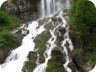 Sotirë falls are unique, in that the water emerges from the rock