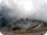 View from the summit, back towards the road. Left the racks for sacrificing the lambs