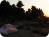 The sun is setting as we put up our tents