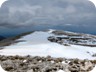 On the summit of Mali i Trebeshinës. A little further on, the secondary summit (with cairn) and further away, another summit with abandonned buildings.