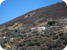 Approaching the first houses (belonging to commune Petrele) on the Përsqop hill. Once you at the house, a few hundred meter to the left is Petrele, where you can stop for drink. But don't forget to continue the journey - the best is still to come!