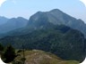 A similar view, in better weather. Left in the distance Dajti Mountain, to the right the twin summits of Brar Mountain, then Gomnit Mountain. On the right, Zeza Canyon