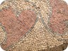 Floor mosaic of a basilica with symbols of eucharist