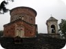 A singularity is the round cupola build on walls forming a square 