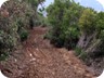 Muddy boots on trail down from Kodra e Luncit