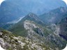 Close to the summit area, looking back to the ridge we came. Far below, the highway Milot-Kukes.