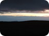 Ararat (on the left, above and under the clouds) across the valley of Yerevan