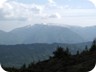 Kendervice Mountain, to the west of the Berat - Këlcyra road. Kendervice has a very high prominence, meaning that you have to descend quite low before being able to climb a peak that is higher than Kendervice itself. See separate trail on this site for a climb of Kendervice.