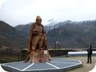 The monument of Idris Sulli in Zhulat. It has been carved out of a tree that used to stand in its place