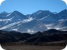 The highest mountain of Kurgyzstan (at the border to China) tops out at over 7400 Meter. Even the mountains seen here, close to the Lake, would provide a lifetime of challenges for the mountaineer.